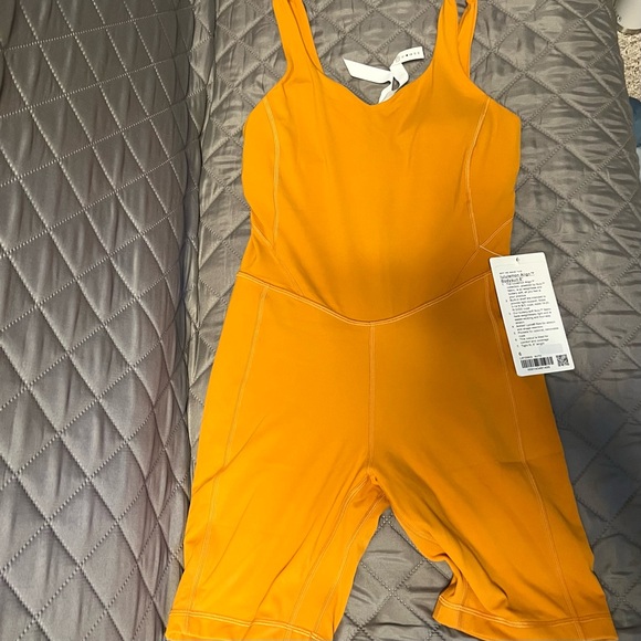 Lululemon Autumn Orange Onesie 8” - Picture 4 of 8